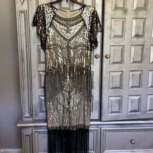 Black sequin dress. Great for a Gatsby party.